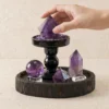 Amethyst Point and Sphere Set on Dark Wood Tray with hand interaction