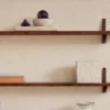 Amethyst Sphere and Point in Travertine Bowl with Tray styled on a floating shelf