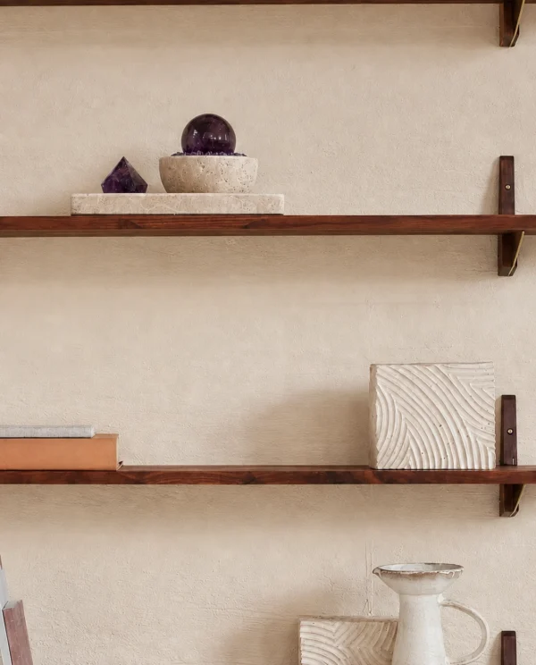 Amethyst Sphere and Point in Travertine Bowl with Tray styled on a floating shelf