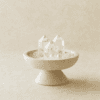 stone-blessings-clear-quartz-towers-on-a-bed-of-clear-quartz-chips-in-a-travertine-pedestal-bowl-front-view Clear Quartz Vessel with Three Points