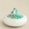 stone-blessings-close-up-of-two-clear-quartz-towers-and-a-green-fluorite-tower-rising-from-clear-quartz-chips-in-an-afghan-jade-bowl Fluorite Vessel with Three Points close-up in a serpentine vessel