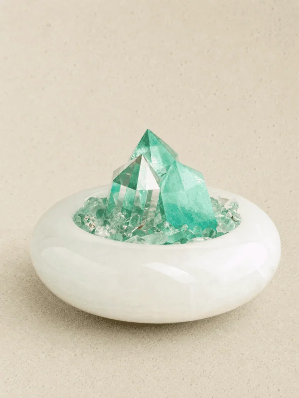 stone-blessings-close-up-of-two-clear-quartz-towers-and-a-green-fluorite-tower-rising-from-clear-quartz-chips-in-an-afghan-jade-bowl Fluorite Vessel with Three Points close-up in a serpentine vessel
