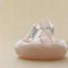 stone-blessings-close-up-of-two-clear-quartz-towers-and-a-rose-quartz-tower-rising-from-rose-quartz-chips-in-an-afghan-pink-jade-bowl Rose Quartz Points in Pink Marble Vessel close-up with clear quartz and rose quartz points