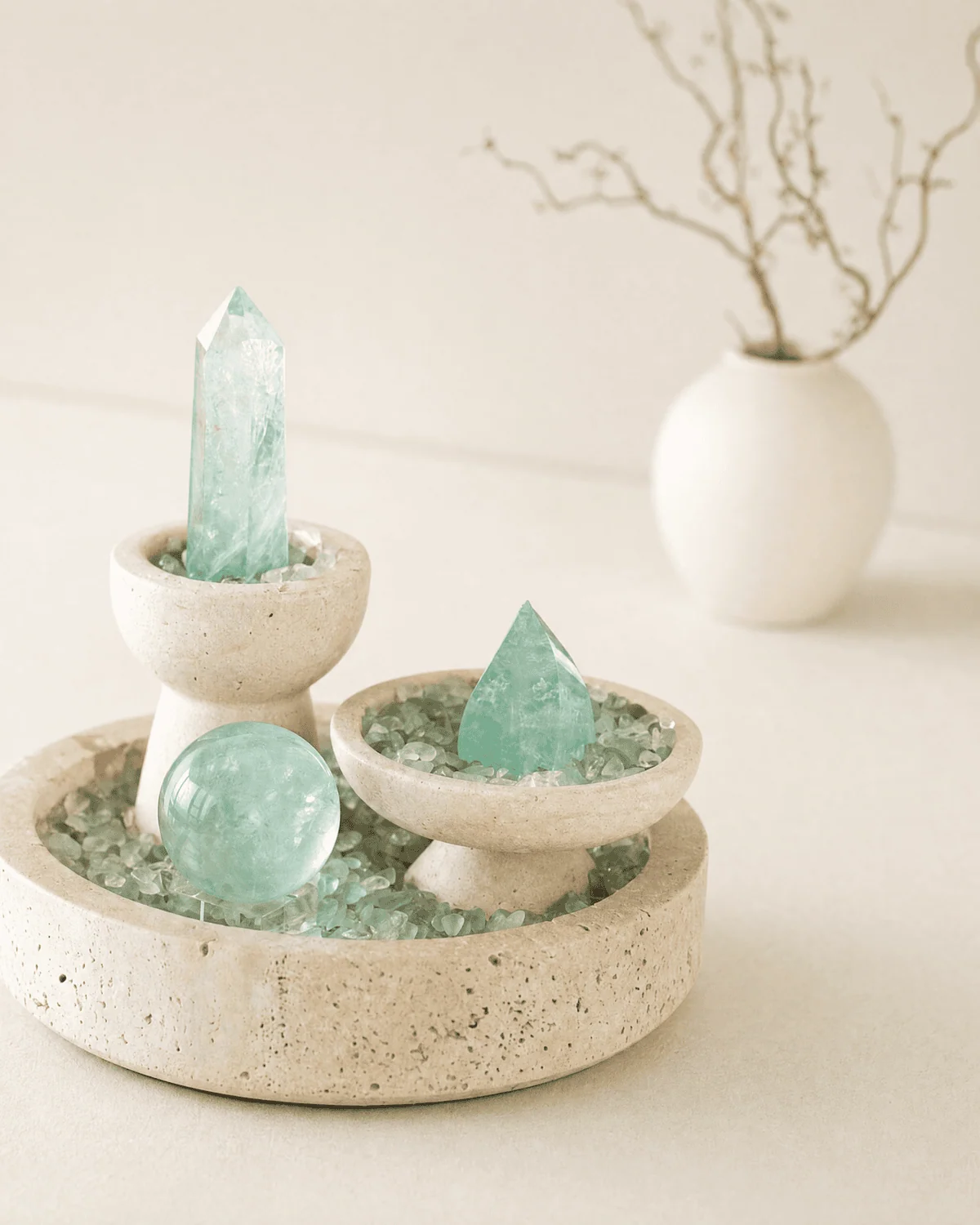 Fluorite crystal objects styled in a quiet interior