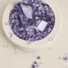 stone-blessings-top-down-view-of-an-amethyst-crystal-bowl-with-a-polished-amethyst-tower-and-chevron-amethyst-chips-in-a-travertine-vessel Stone Blessings top down view of an amethyst crystal bowl with a polished amethyst tower and chevron amethyst chips in a travertine vessel