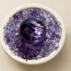 Stone Blessings top down view of an amethyst sphere centerpiece showing chevron amethyst chips in a stone vessel