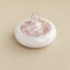 stone-blessings-top-down-view-of-clear-quartz-and-rose-quartz-towers-set-on-rose-quartz-chips-in-an-afghan-pink-jade-bowl Rose Quartz Points in Pink Marble Vessel top-down view