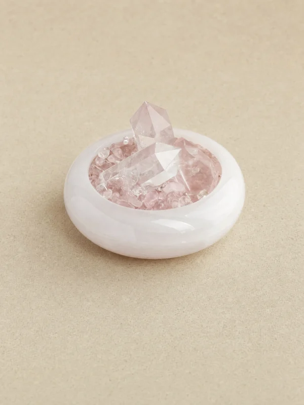 stone-blessings-top-down-view-of-clear-quartz-and-rose-quartz-towers-set-on-rose-quartz-chips-in-an-afghan-pink-jade-bowl Rose Quartz Points in Pink Marble Vessel top-down view