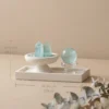 Fluorite Points and Sphere on Travertine Tray styled with dried branches