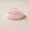 stone-blessings-rose-quartz-sphere-on-a-bed-of-rose-quartz-chips-in-an-afghan-pink-marble-bowl-front-view (1) Rose Quartz Sphere in Pink Marble Vessel